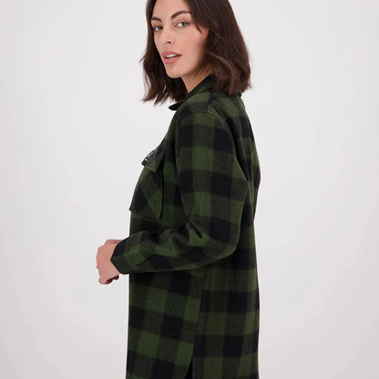 Woman wearing Swanndri Ranger Womens bush shirt in olive green and black plaid flannel