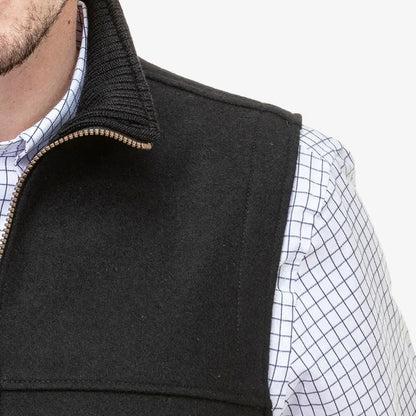 Black Swanndri Saddleback Vest with ribbed collar over white checkered shirt for country clothing outdoors