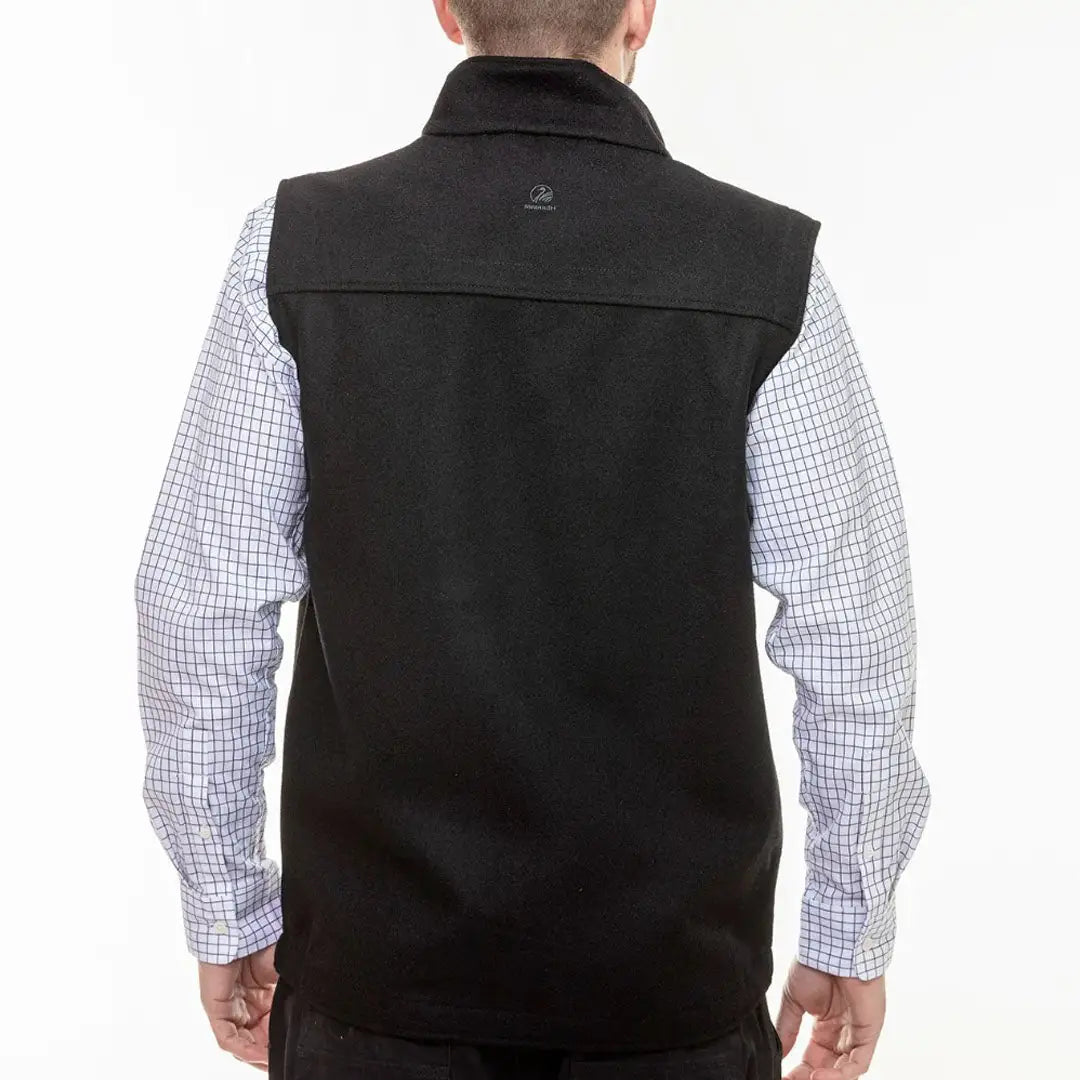 Men’s black fleece vest over checkered shirt, perfect for country clothing and hunting outdoors
