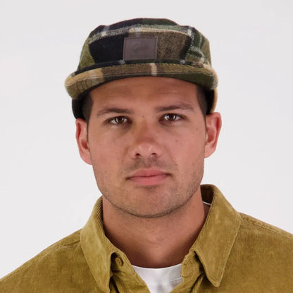 Man wearing Swanndri Wentworth Valley v2 Wool Cap in green, black, tan plaid and mustard shirt