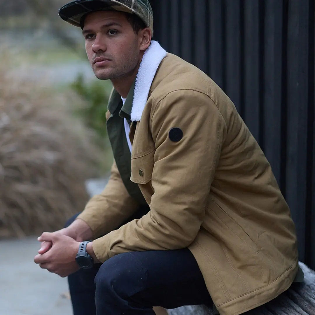 Men’s tan Swanndri Wentworth Valley jacket with white sherpa collar for cozy style
