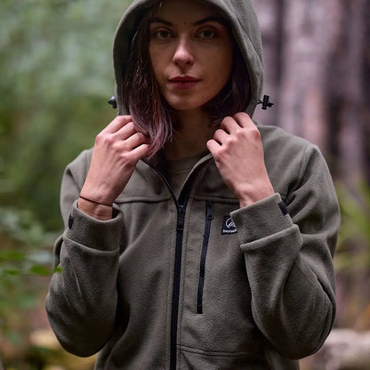 Woman in Swanndri High Rock zip water resistant recycled fleece hoodie with hood