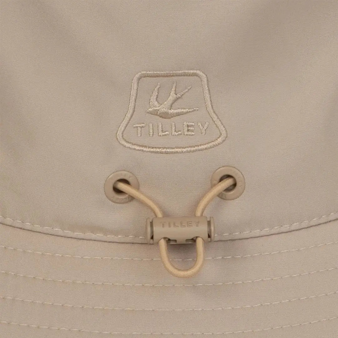 Beige Tilley Logo Technical T1 Bucket Hat perfect for outdoor adventures