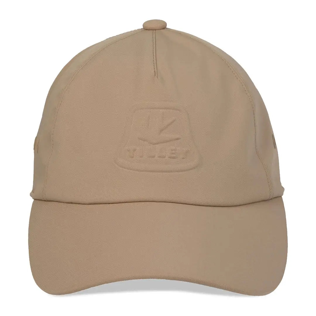 Beige baseball cap from Tilley Tech Travel for stylish outdoor adventures