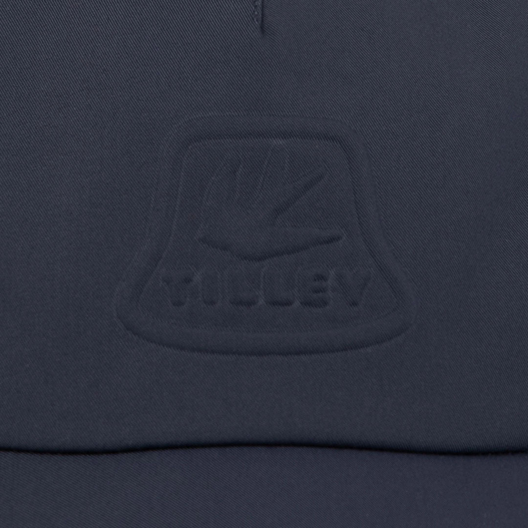 Embossed dark blue fabric of the stylish Tilley Tech Travel Cap