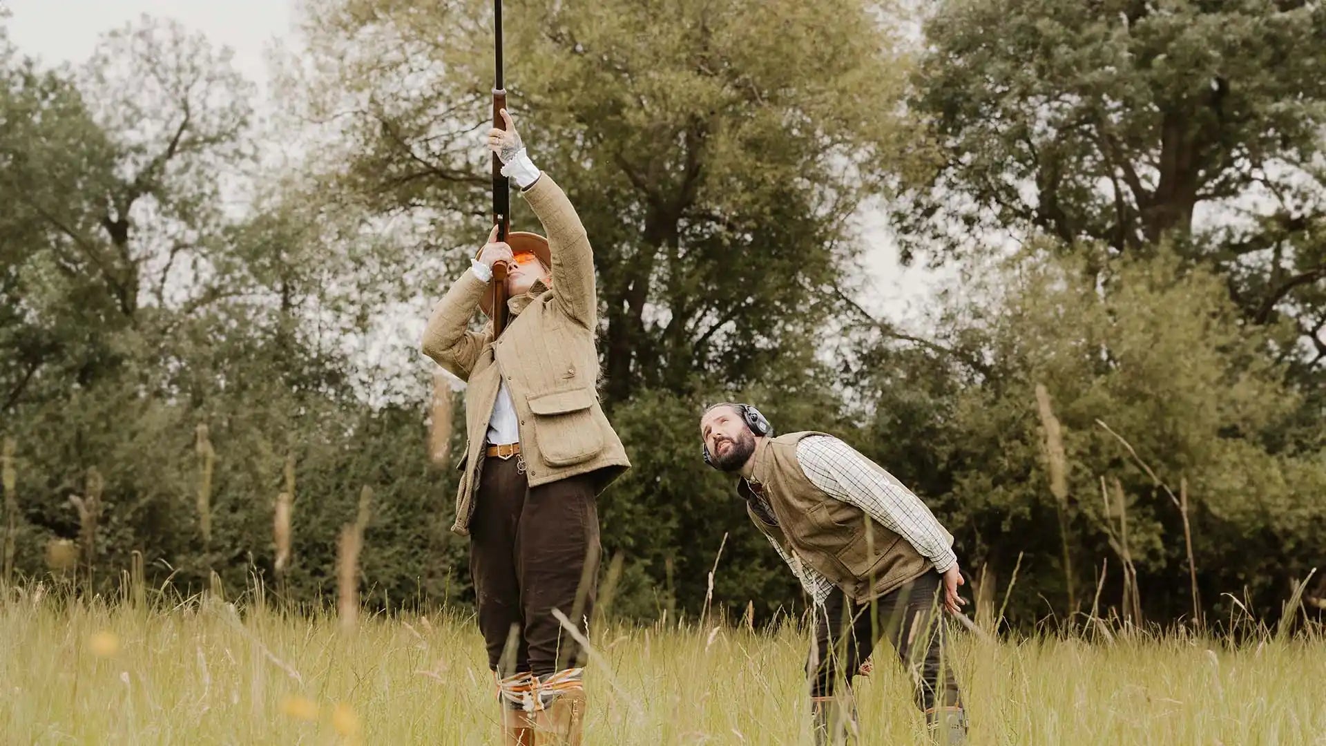 Two men in hunting attire.