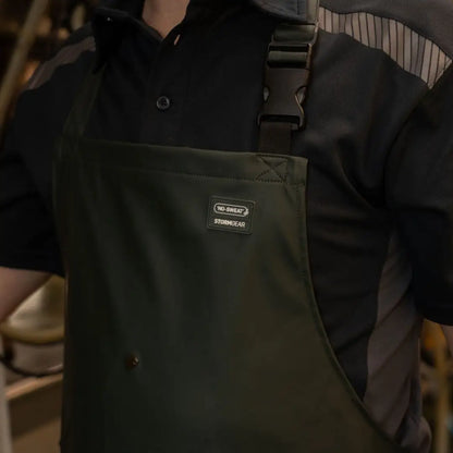 Dark green waterproof dairy apron with black buckle, great for clinical mastitis work